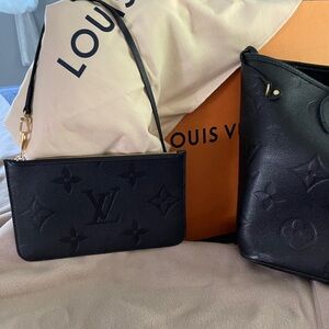 Louis Vuitton black leather wristlet/pouch.
